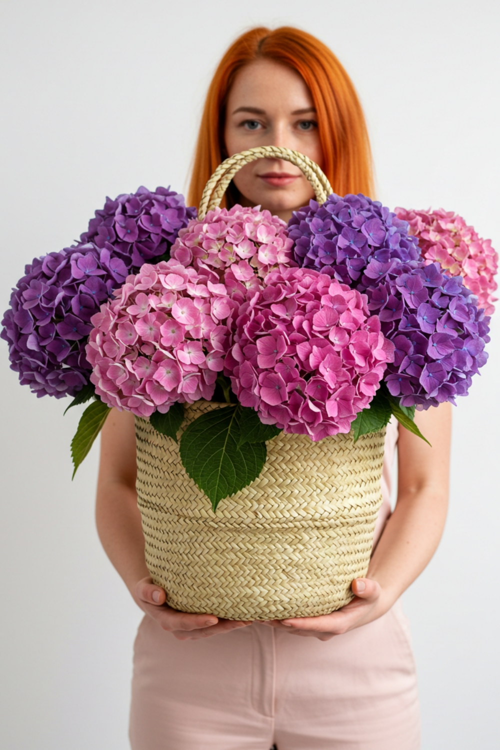 Woman Holding a Basket of Hydrangeas Woman Holding a Basket of Hydrangeas